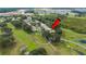 Aerial view showing home's location in a golf course community at 202 Golf Aire Blvd, Winter Haven, FL 33884