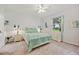 Bedroom with window, double bed, and ample closet space at 202 Golf Aire Blvd, Winter Haven, FL 33884
