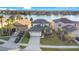 Two-story house with a three-car garage and lake view in a quiet cul-de-sac at 2199 Ontario Way, Lakeland, FL 33805