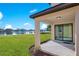 Covered patio overlooking a lake at 2199 Ontario Way, Lakeland, FL 33805
