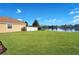 Large backyard with lake view and privacy fence at 2199 Ontario Way, Lakeland, FL 33805