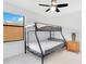 Bedroom with a bunk bed and ceiling fan at 2199 Ontario Way, Lakeland, FL 33805