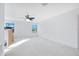 Spacious bedroom with lake view and ceiling fan at 2199 Ontario Way, Lakeland, FL 33805