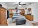 Bedroom with a large bed and built-in wooden cabinets at 2199 Ontario Way, Lakeland, FL 33805