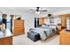 Main bedroom with a large bed and built-in wooden cabinets at 2199 Ontario Way, Lakeland, FL 33805
