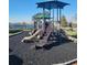 Community playground with modern play structures and safety surface at 2199 Ontario Way, Lakeland, FL 33805