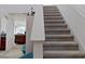 Indoor view of carpeted staircase leading to the second floor at 2199 Ontario Way, Lakeland, FL 33805