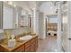 Elegant bathroom with a large soaking tub and double vanity at 3206 Heron Cv, Winter Haven, FL 33884