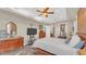 Spacious bedroom with plenty of natural light and hardwood floors at 3206 Heron Cv, Winter Haven, FL 33884