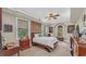 Bright bedroom with a comfortable bed and ample closet space at 3206 Heron Cv, Winter Haven, FL 33884