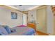 Serene bedroom with a double bed and hardwood floors at 3206 Heron Cv, Winter Haven, FL 33884