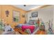 Bright bedroom with a cozy bed and hardwood floors at 3206 Heron Cv, Winter Haven, FL 33884