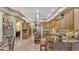 Open concept kitchen with island, breakfast bar and stainless steel appliances at 3206 Heron Cv, Winter Haven, FL 33884