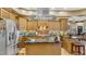 Modern kitchen with stainless steel appliances and large island at 3206 Heron Cv, Winter Haven, FL 33884