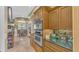 Kitchen boasts double ovens, ample cabinetry, and a breakfast nook at 3206 Heron Cv, Winter Haven, FL 33884