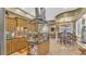 Spacious kitchen with island, stainless steel appliances, and breakfast area at 3206 Heron Cv, Winter Haven, FL 33884