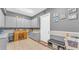 Spacious laundry room with cabinets and a work desk at 3206 Heron Cv, Winter Haven, FL 33884