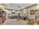 Spacious living room featuring comfortable seating and large windows at 3206 Heron Cv, Winter Haven, FL 33884