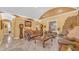 Living room with a stone fireplace and high ceilings at 3206 Heron Cv, Winter Haven, FL 33884