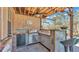 Outdoor kitchen with grill, sink, and mini-refrigerator at 3206 Heron Cv, Winter Haven, FL 33884