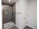 Clean bathroom with a large shower and grey tile at 4437 Juliana Lake Dr, Auburndale, FL 33823