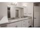 Modern bathroom with granite countertop double vanity at 4437 Juliana Lake Dr, Auburndale, FL 33823