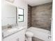 Updated bathroom with granite vanity and shower at 4437 Juliana Lake Dr, Auburndale, FL 33823