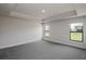 Bright bedroom featuring carpet flooring and large windows at 4437 Juliana Lake Dr, Auburndale, FL 33823