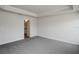 Well-lit bedroom with carpet flooring and en-suite bathroom at 4437 Juliana Lake Dr, Auburndale, FL 33823