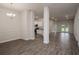Bright dining area with hardwood floors and access to kitchen at 4437 Juliana Lake Dr, Auburndale, FL 33823