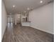 Spacious living room with hardwood floors and access to backyard at 4437 Juliana Lake Dr, Auburndale, FL 33823