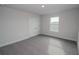 Simple bedroom with gray carpet and double closet at 4443 Juliana Lake Dr, Auburndale, FL 33823
