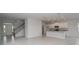 Kitchen with white cabinets, granite countertops, and an island at 4443 Juliana Lake Dr, Auburndale, FL 33823