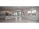 Kitchen with white cabinets, granite countertops, and an island at 4443 Juliana Lake Dr, Auburndale, FL 33823