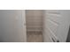 Well-lit pantry with wire shelving at 4443 Juliana Lake Dr, Auburndale, FL 33823