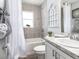 Clean bathroom with a bathtub, shower, and updated vanity at 5435 Se 127Th Ln, Belleview, FL 34420