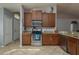 Kitchen with stainless steel appliances and granite countertops at 5791 Woodruff Way, Lakeland, FL 33812