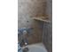 Shower with tile and corner shelf at 611 Limber Ln, Lakeland, FL 33810