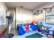 Bedroom with single bed and blue bedding at 611 Limber Ln, Lakeland, FL 33810