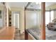 Guest bedroom with wooden canopy bed and access to bathroom at 6243 Egret Dr, Lakeland, FL 33809
