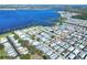 Aerial view of home and community by the lake at 6683 Briarhill Ne Dr, Winter Haven, FL 33881