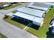 Aerial view showcasing home and carport at 6683 Briarhill Ne Dr, Winter Haven, FL 33881