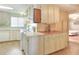 Kitchen boasts ample cabinet space and a wood countertop at 6683 Briarhill Ne Dr, Winter Haven, FL 33881