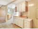 View of kitchen with additional cabinets and wood countertops at 6683 Briarhill Ne Dr, Winter Haven, FL 33881