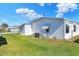 View of the side yard and neighboring homes at 6683 Briarhill Ne Dr, Winter Haven, FL 33881