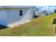 View of the side yard and neighboring homes at 6683 Briarhill Ne Dr, Winter Haven, FL 33881
