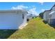 View of the side yard and neighboring homes at 6683 Briarhill Ne Dr, Winter Haven, FL 33881