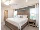 Spacious Primary bedroom with a king-size bed and ensuite bathroom at 6929 161St E Ter, Parrish, FL 34219