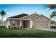Attractive single-story home with a two-car garage and landscaping at 6929 161St E Ter, Parrish, FL 34219