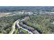 Aerial view highlighting home's proximity to community amenities and green space at 8205 Roseville, Davenport, FL 33896